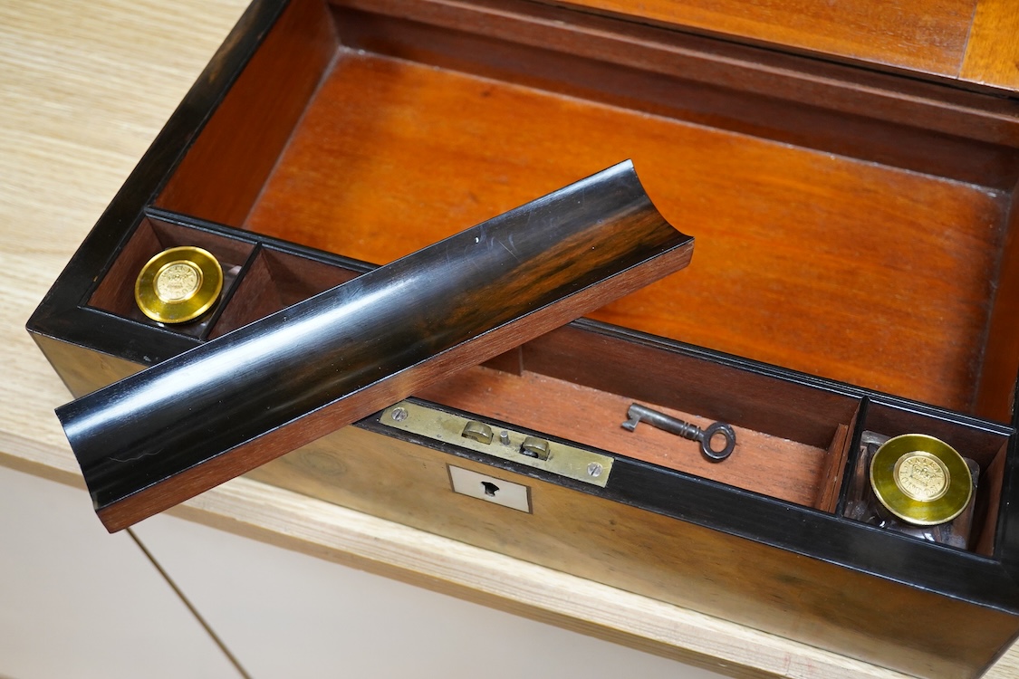 A 19th century burr walnut writing slope with mother of pearl plaque inscribed Ellen Warner, Dec, 8th 1868, 36cm wide